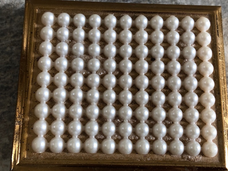 Vintage compact with faux pearls