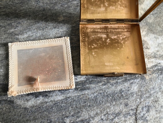 Vintage compact with faux pearls