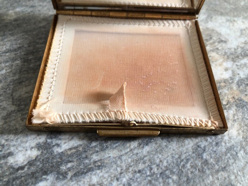 Vintage compact with faux pearls