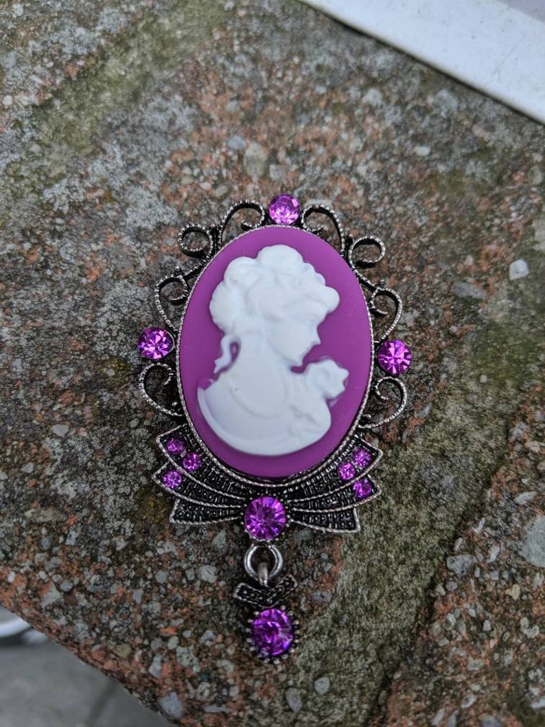 purple cameo brooch