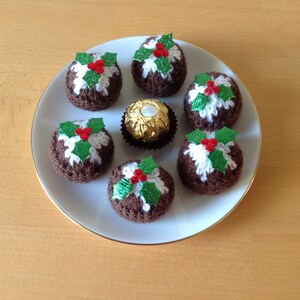 Hand knitted Christmas pudding cover for a Ferrero Rocher chocolate or similar. Ideal decoration for your Christmas table.