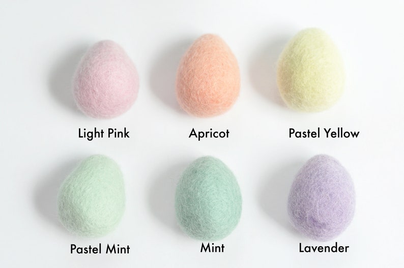 May include: Six felt balls in various pastel colors: light pink, apricot, pastel yellow, pastel mint, mint, and lavender.