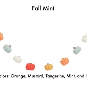 Fall mint all felt pumpkin garland with orange, mustard, tangerine, mint, and ivory pumpkins.