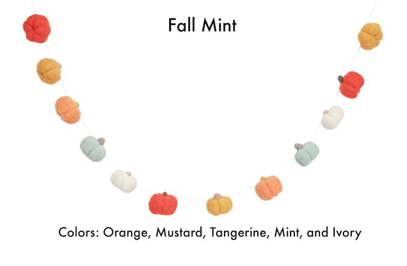 Fall mint all felt pumpkin garland with orange, mustard, tangerine, mint, and ivory pumpkins.