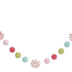 4 foot felt peppermint garland with light pink, red, green, and aqua wool balls.  Perfect for letter board, mantel, hang from a shelf, or tiered tray.