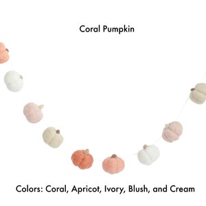 Coral all felt pumpkin garland featuring coral, apricot, ivory, blush, and cream.