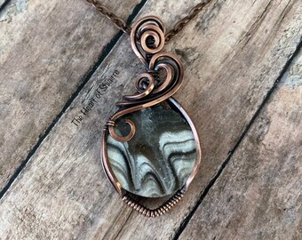 Zebra Calcite wire wrapped pendant. Phantom Calcite. Copper. Calming. Relaxing. Grounding. Handcrafted artisan jewelry. Gift idea.
