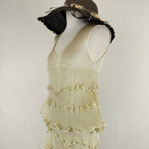 A unique dress made of viscose silk and gold metalized thread. A golden dress with ruffles. Knitted dress. Midi dress image 1