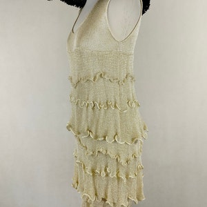 A unique dress made of viscose silk and gold metalized thread. A golden dress with ruffles. Knitted dress. Midi dress image 10