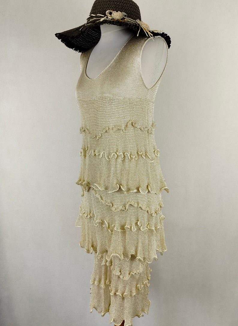 A unique dress made of viscose silk and gold metalized thread. A golden dress with ruffles. Knitted dress. Midi dress image 2