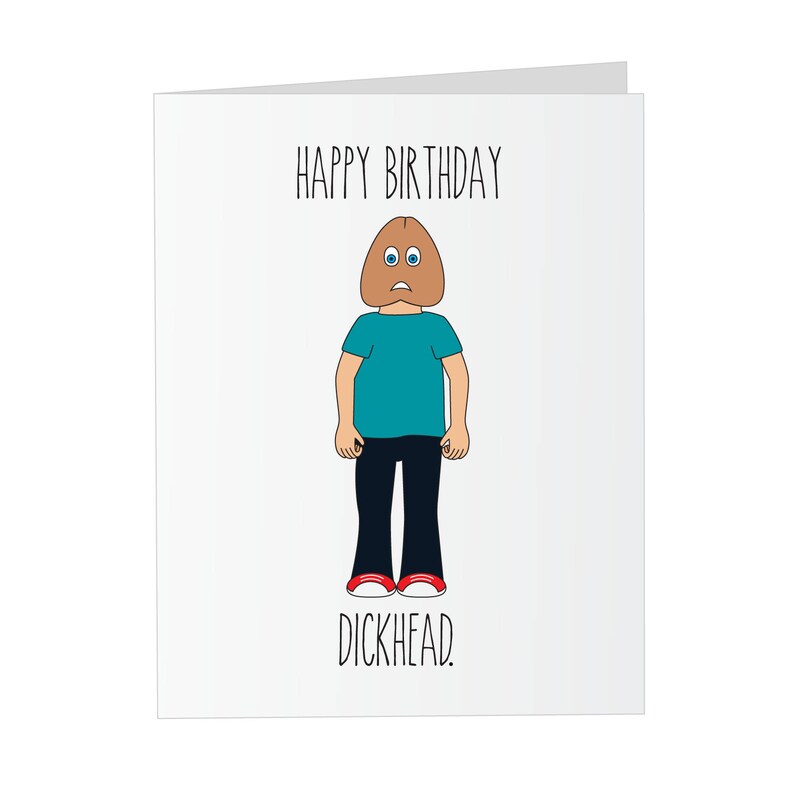 May include: A humorous birthday card with a cartoon illustration of a person with a brown head and blue eyes. The text reads "Happy Birthday Dickhead."