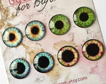 May include: Eight pairs of colorful doll eyes with black pupils. The eyes are on a white card with the text "GOOD EYES for Blythe" and "063-1" in the top right corner.