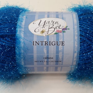 Intrigue Yarn Bee, 85 g, 251 år, Medium 4 - Glittrar Cabana-Blue