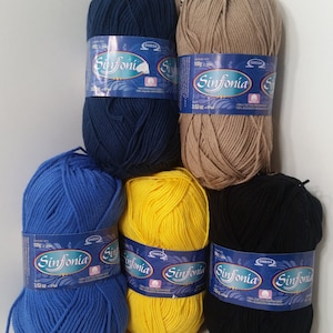 May include: Six balls of yarn in different colors: blue, yellow, black, brown, and two shades of blue. Each ball has a label that says "Sinfonia" and "100% Cotton Material".