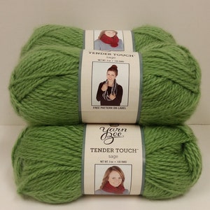 May include: Two balls of Yarn Bee Tender Touch yarn in the colour sage. Each ball contains 3 ounces of yarn and 135 yards.