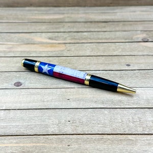 Weathered Texas flag Sierra style writing pen
