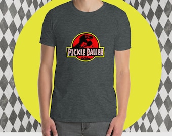 Pickleballer T-Shirt: Funny Dino Movie Inspired Design