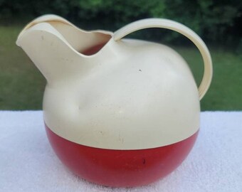 Red & White Celluloid Water Pitcher