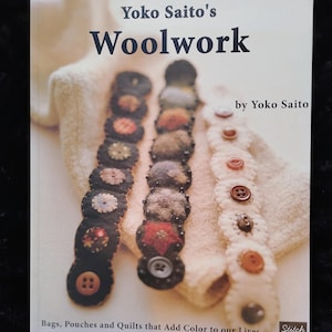 May include: A set of three ceramic mugs with a speckled, matte finish. Each mug features a different color: light blue, cream, and gray. The mugs have a simple, modern design and a comfortable handle.