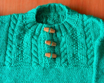 Unisex, Round neck, Jumper, Cable Pattern on Yoke, back and front, 3 Button fastening,Childrens.