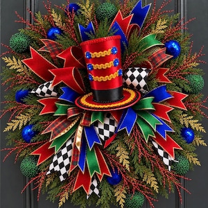 May include: A decorative wreath featuring a central red top hat with gold trim and blue accents, surrounded by green pine branches, red, blue, and green ornaments, and ribbons in solid red, blue, green, and black-and-white checkered patterns.