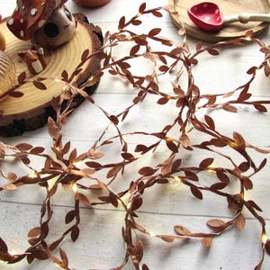 Brown leaf fairy lights. Autumn string lights. Rustic fall home decor. Farmhouse country aesthetic. Boho Halloween Thanksgiving decorations
