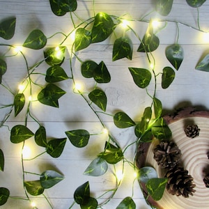 Ivy leaf fairy lights up to 10m. Green leaf string lights. Greenery garland bunting Christmas decoration. Wedding decor woodland centrepiece