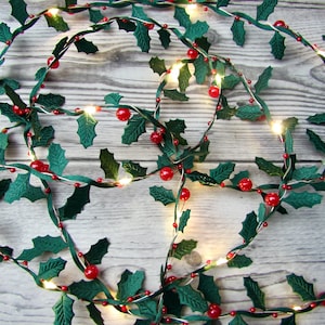 Mini Holly Fairy Lights. Christmas decoration, LED string lights Holly leaf & red berries. Traditional midcentury retro xmas party decor