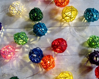 Rainbow LED lights. Holiday decor Xmas Multi coloured fairy lights, LED string lights of natural rattan willow ball ornaments. Night light