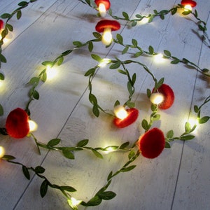 Mushroom Fairy Lights Green Leaf garland. LED red toadstool lamp string lights. Fairycore woodland nursery party decor. Goblincore fall vine