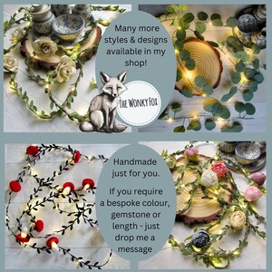 May include: A string of fairy lights wrapped around a garland of faux greenery with small red mushroom-shaped ornaments. The lights are warm white and the garland is black. The text "Handmade just for you. If you require a bespoke colour, gemstone or length - just drop me a message" is visible in the image.