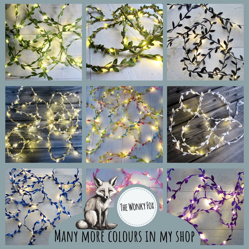 May include: A collage of images showing different colors of fairy lights with leaves. The lights are strung on a wire and have small, white bulbs. The leaves are made of fabric and are in various colors, including green, black, white, yellow, pink, blue, and purple. The text "The Wonky Fox" and "Many More Colours In My Shop" is visible in the image.