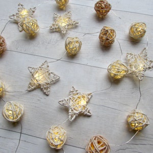 Christmas Garland with Star LED lights. Holiday decor Xmas Star fairy lights, LED string lights of natural rattan star christmas ornaments