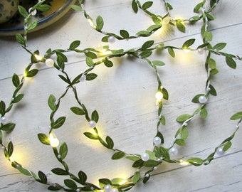 Pearl & leaf fairy lights. Vine leaves greenery garland. Battery string lights. Boho wedding home decor. Bedroom Dining table party lighting