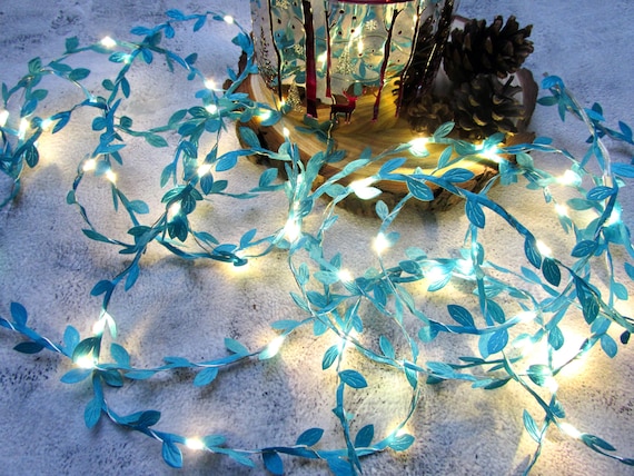 Frosty blue rustic string lights. Holiday fairy lights. Leaf garland bunting, Christmas lights, Farmhouse home decor, winter wedding table