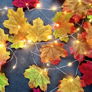 Autumn fairy lights. Fall leaves string lights. Cottagecore room Halloween home decor. Woodland Autumn decor,  Rustic wedding table decor uk