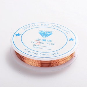 May include: A spool of copper wire for jewelry making. The label reads "Special for Jeweller" and "Copper Wire".
