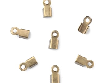 100 terminali in ferro bronzo antico a crimpare capicorda 6x3x2,3 mm foro 1,2 mm