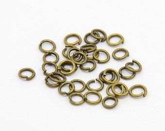 100 Biegeringe 4mmx0,7mm antik bronze Binderinge