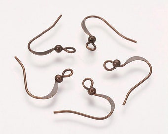 May include: Five antique copper-toned earring hooks with a small ball at the top of each hook.