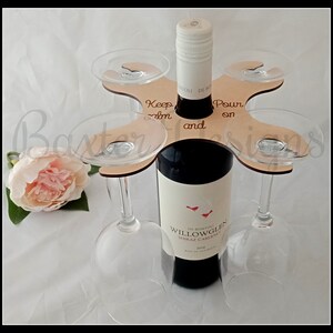 Wine Glass holder caddy over bottle image 1