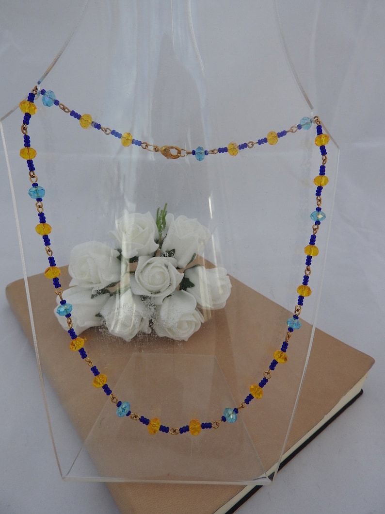 Handmade blue and yellow beaded necklace
