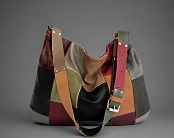 Borsa a tracolla grande in pelle patchwork, modello morbido con tracolla regolabile.