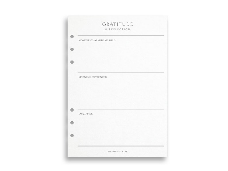 May include: A white planner page with the text "GRATITUDE & REFLECTION" at the top. The page is divided into sections for "MOMENTS THAT MADE ME SMILE," "KINDNESS EXPERIENCED," and "SMALL WINS." The Studio Scribe logo is at the bottom.