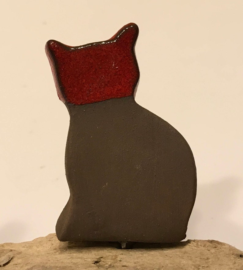 Three little enameled cats sitting on driftwood image 3