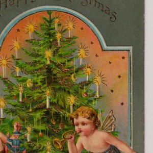 Piccole FATE/CHERUINI con albero di Natale e giocattoli, cartolina di Natale d'artista antica, Raphael Tuck #8143, pubblicata nel 1906