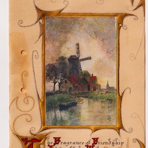 Moulin à vent, rivière avec bateau, ciel maussade, déchets/cartes éphémères de Noël d'artiste victorien, papier parchemin, touches dorées, c1900