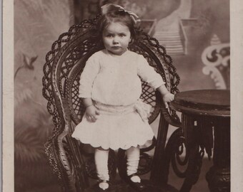 Little GIRL poses on Chair, Lovely Dress, Antique Real Photo Studio PostCard, c1910