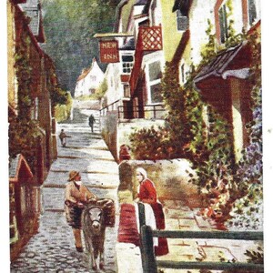 CLOVELLY, DEVON, High Street, Esel Transport, antike Künstler-Postkarte, E.D. Percival, 1908