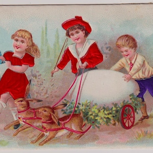 Antieke Franse Victoriaanse handelskaart met reliëf, CHOCOLAT POULAIN, KINDEREN met ei en kar getrokken door konijn, zijden applicatie, 1890